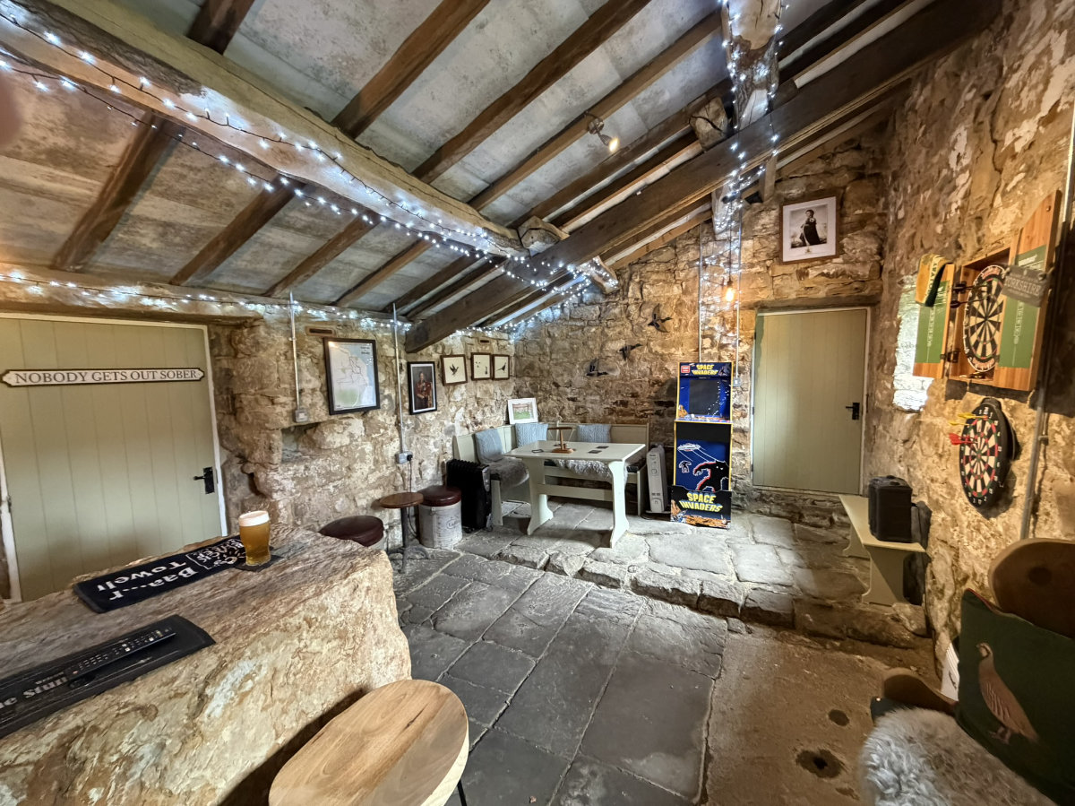 The bar and seating inside The Stumble Inn