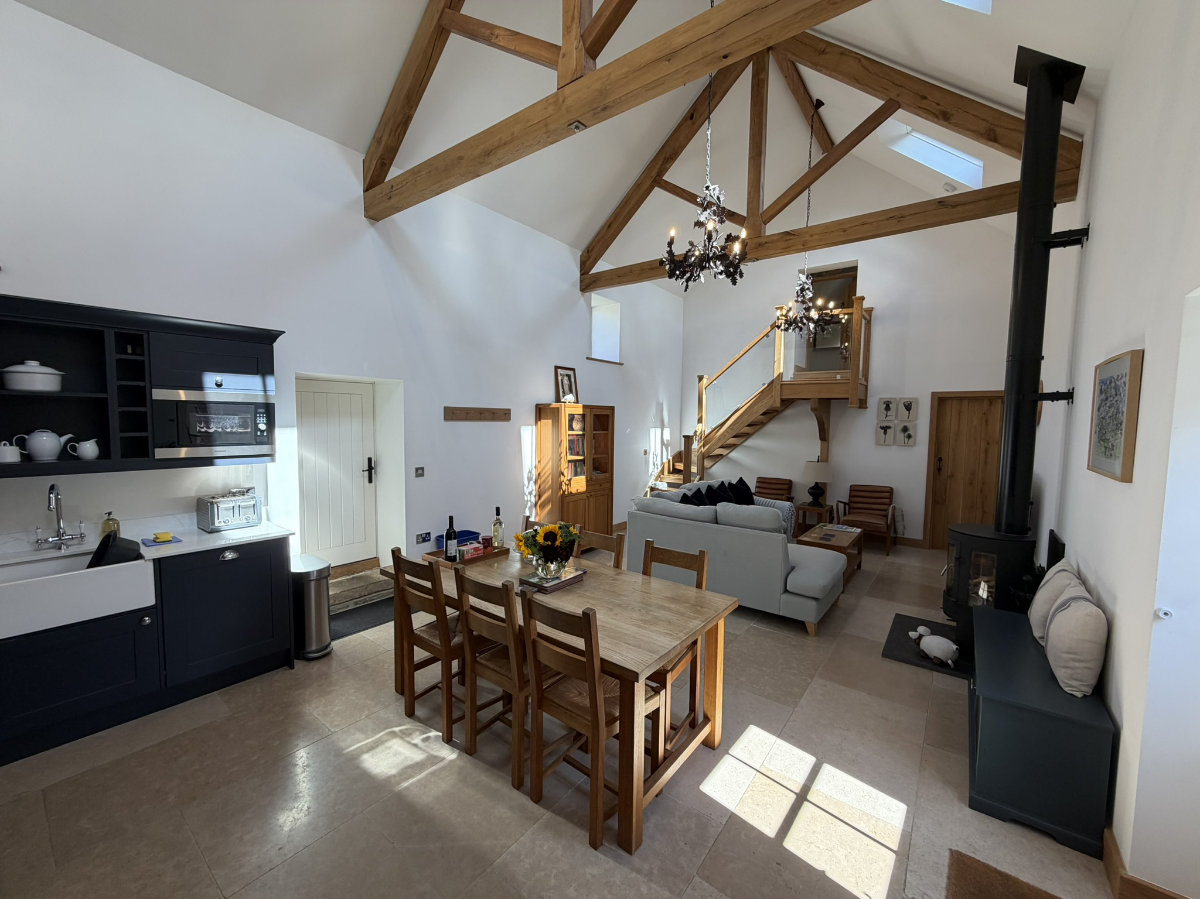 Owl Barn — open plan living with wood burner